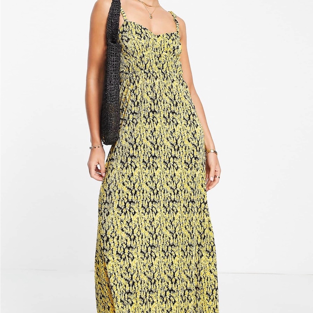 ASOS DESIGN plisse strappy maxi dress in yellow daisy print